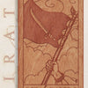 A wooden tarot card from the Pirate Tarot deck by Schiffer Publishing, Ltd. shows a hand with a sword and flag under cloudy skies, with "ACE of SWORDS" and "Triumph, Force, Intellect" inscribed below the image.
