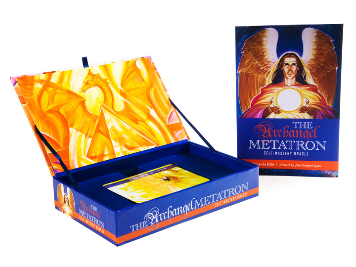 The Archangel Metatron Self-Mastery Oracle by Schiffer Publishing, Ltd. includes a boxed set with cards and an upright guidebook featuring an angel with golden wings holding a glowing orb for spiritual guidance.