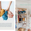 A hand holds yellow, blue, and pink yarn skeins in a well-lit craft room with supplies and a loom—an inviting space for projects from Schiffer Publishing, Ltd.'s Welcome to Weaving 2. The text reads: Section 1 Preparation.