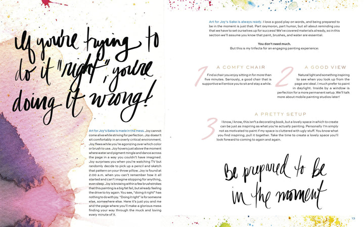 A vibrant magazine spread for Schiffer Publishing, Ltd.'s "How to Make Art for Joy’s Sake" features watercolor splashes, bold art wisdom—“If you’re trying to do it right, you’re doing it wrong!”—and tips on cozy art spaces with a comfy chair and soft light.
