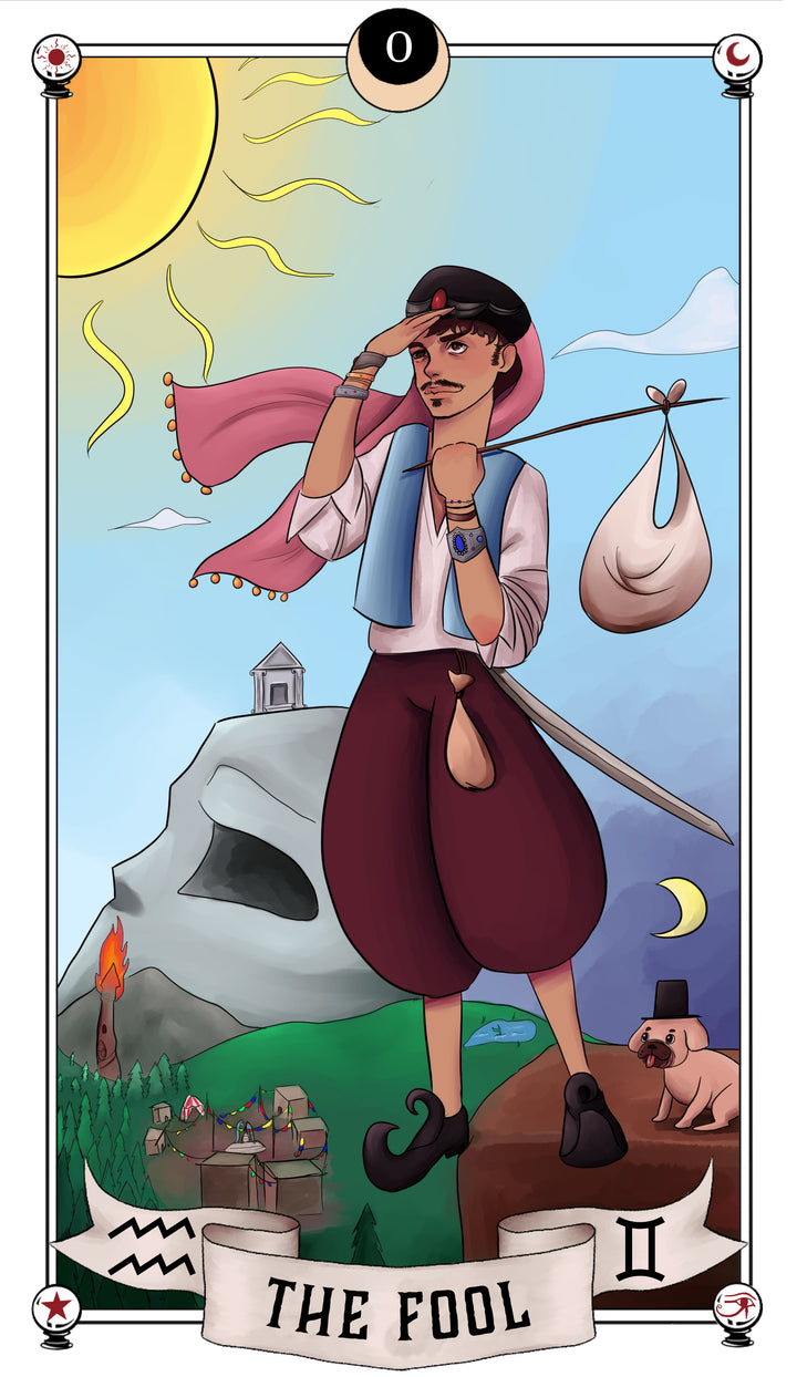 The Fool card from the Auset Gypsy Tarot by Schiffer Publishing, Ltd. shows a traveler in loose red pants, pink scarf, and cap with a bundle on a stick, standing on a hill under the sun near a village, dog, and cliff with a face.