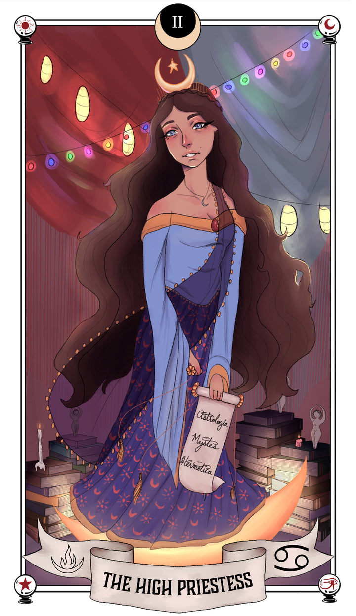 The Auset Gypsy Tarot by Schiffer Publishing, Ltd. features The High Priestess as a serene woman with long, wavy hair in a blue dress and crescent moon crown, holding a scroll among astrological symbols and stacks of books.