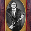 The American Renaissance Tarot by Schiffer Publishing, Ltd. features a Pioneer of Swords card depicting a bearded man with shoulder-length hair in historical attire with fur trim, holding a sword or cane, surrounded by ornate gold and red borders.