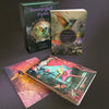 The Hummingbird Wisdom Oracle Cards by Schiffer Publishing, Ltd. are shown with their box, guidebook, and vibrant illustrated cards featuring hummingbirds and florals—a great choice for fans of mystical oracle decks.