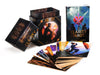 The Clarity Tarot (Deck and Guidebook Box Set) by Schiffer Publishing, Ltd. is shown with its open box and fanned cards, featuring mystical artwork like a central figure and crossed swords—perfect for cartomancy enthusiasts.