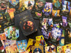 A Clarity Tarot (Deck and Guidebook Box Set) box from Schiffer Publishing, Ltd. is surrounded by vibrant cards from the deck, showcasing cartomancy icons like the High Priestess, Judgment, Cups, Pentacles, and Wands.