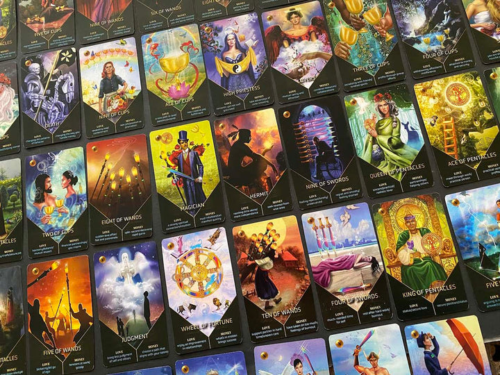 A vibrant display of the Clarity Tarot (Deck and Guidebook Box Set) by Schiffer Publishing, Ltd., featuring beautifully illustrated cards—wands, cups, swords, and pentacles—on a dark background. Ideal for tarot enthusiasts.