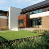 A modern house with large windows, wood and metal accents, and minimalist landscaping inspired by Chesapeake gardens is shown alongside a contents list from "Private Gardens of the Potomac and Chesapeake" by Schiffer Publishing, Ltd.