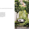 Repose in the Metropolis by Schiffer Publishing, Ltd. showcases a tranquil outdoor oasis with tall trees, lush ferns, a circular daybed with cushions, and a modern water feature set on a stone patio contrasting the greenery.