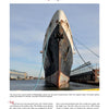 The SS United States, featured by Schiffer Publishing, Ltd., rests quietly at a Philadelphia pier, its weathered hull reflecting the storied ocean liner's past and its once record-breaking transatlantic legacy under a clear sky.