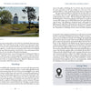 A white lighthouse atop a grassy hill, framed by trees and wooden posts, embodies the spirit of Hudson River Valley history—featured in "Hudson Valley History & Mystery, Volume 2" from Schiffer Publishing, Ltd.