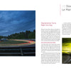 A glowing Formula 1 photography shot adorns the right page, as a race car speeds along a night track with colorful light trails, dramatic sky, and trees—all from "Inside Formula 1" by Schiffer Publishing, Ltd.