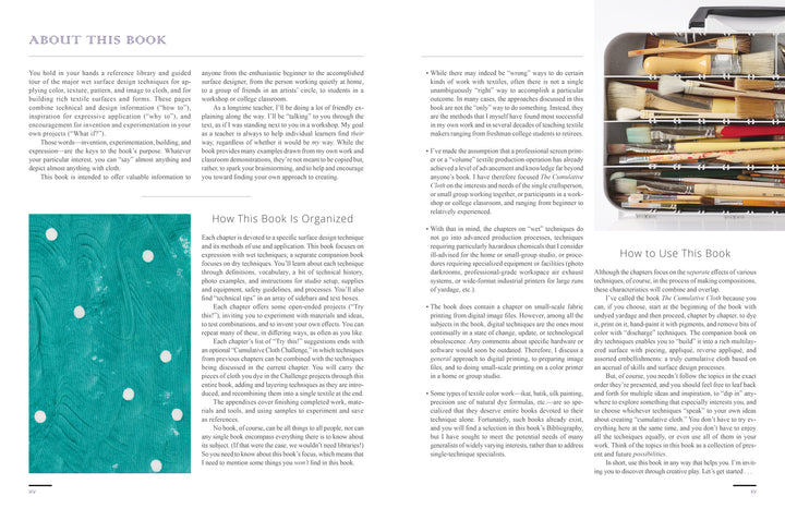 An open spread of "The Cumulative Cloth, Wet Techniques" by Schiffer Publishing, Ltd. shows the book’s organization, a teal abstract art with white dots on the left page, and assorted paintbrushes inspiring fabric surface design in the corner.