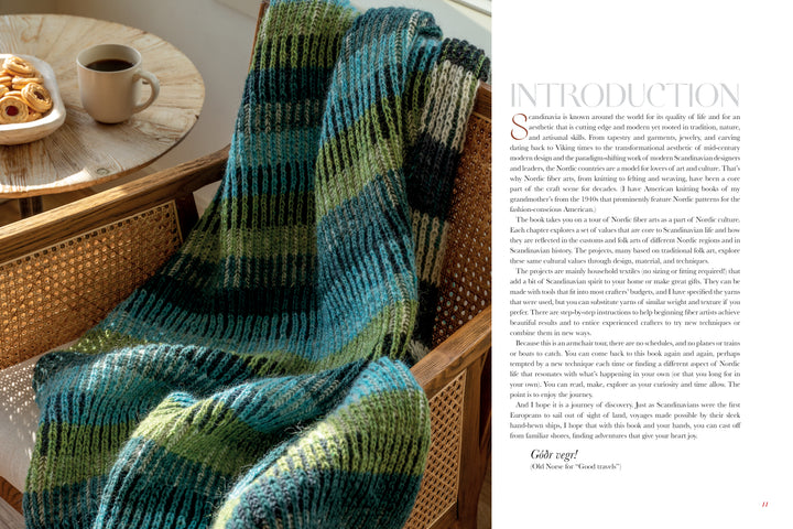 A striped knit blanket from "Nordic Hands" by Schiffer Publishing, Ltd. is draped over a woven chair next to a table with pastries and coffee. The page includes an introductory text about Scandinavian culture.