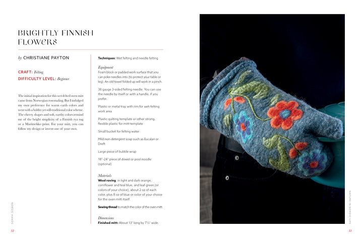 A person wearing Nordic Hands gloves by Schiffer Publishing, Ltd., featuring a flower design inspired by Scandinavian fiber art.
