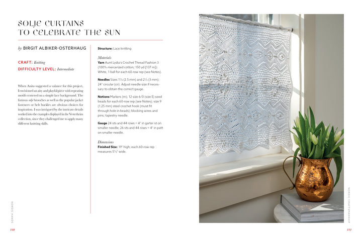 A bright, airy room features Nordic Hands by Schiffer Publishing, Ltd.—a delicate white curtain with a geometric diamond pattern inspired by Scandinavian fiber art—hung in a sunlit window beside a copper pitcher with greenery.