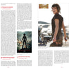 A magazine spread reviews post-apocalyptic films in "World Gone Wild, Restocked and Reloaded 2nd Edition" by Schiffer Publishing, Ltd., with text columns, movie posters, and an action shot of a woman holding a weapon outdoors on the right page.