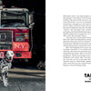 A Dalmatian sits before a red FDNY truck numbered 20 in a dim firehouse. “Paws of Firefighters” by Schiffer Publishing, Ltd. features gear-laden trucks and stories about Dalmatians and New York firefighters on the right.
