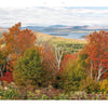Experience Maine’s stunning autumn scenery with vibrant red, orange, and yellow foliage, distant lakes and mountains under a partly cloudy sky. Brought to you by Schiffer Publishing, Ltd.