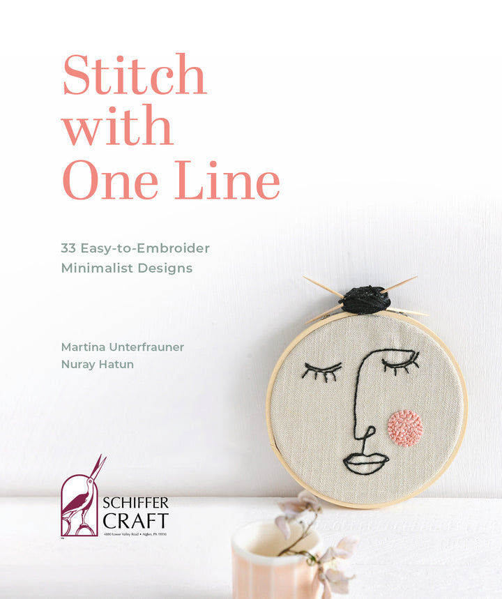 The “Stitch with One Line” book by Schiffer Publishing, Ltd. shows minimalist one-line face embroidery in a hoop with pink cheek, black thread spool, and small flower on a white cover—ideal for beginner embroidery projects.