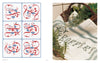 On the left is Schiffer Publishing, Ltd.'s "Vintage French Needlework" featuring red and blue floral calligraphy; on the right, a white cloth with green embroidered letters sits in a basket with herbs and greenery.