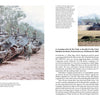 US soldiers prepare for action on and around M42 Duster antiaircraft vehicles by Schiffer Publishing, Ltd.; nearby tanks advance across a field bordered by trees and mountains during the Vietnam War.