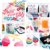A bright Schiffer Publishing, Ltd. Sublimation Crafting magazine features a contents list and vivid photos of mugs, bags, earrings, coasters, and decor with cheerful floral and heart motifs.