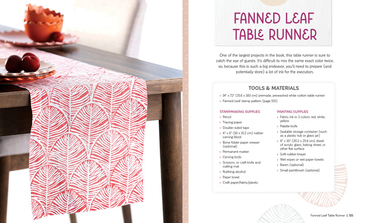 A pink and white fanned leaf table runner made with Fabric Stamping by Schiffer Publishing, Ltd. rests on a wooden table with red apples, while a book page lists materials, tools, and instructions for making the runner.