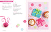 The book "Crochet Girls" by Schiffer Publishing, Ltd. shows how to crochet gift box toppers for cupcakes, with step-by-step instructions and photos featuring bright yarn ribbons, pink confetti, and a pink ball of yarn.