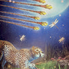 A cheetah crouches in grass under a starry sky with a large moon as eight wands and dragonflies fly overhead. "Eight of Wands" is at the bottom left. From The Westwood Tarot by Schiffer Publishing, Ltd.