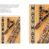 Two handwoven sashes with geometric designs in black, white, and brown lay on wood. Their diamond and floral patterns highlight traditional styles featured in Pick-Up Bandweaving Designs by Schiffer Publishing, Ltd.