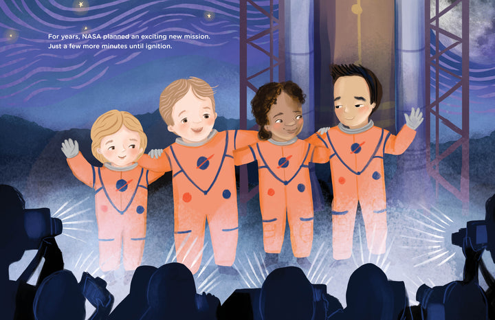 Four children in orange astronaut suits stand arm-in-arm, waving for cameras by a rocket launchpad at night in "Reaching for the Stars" from Schiffer Publishing, Ltd.—a picture book capturing the excitement of NASA Artemis missions and space exploration.