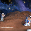 In "Reaching for the Stars" by Schiffer Publishing, Ltd., two kids in spacesuits explore a rocky planet with swirling stars and a rover nearby as they discover STEM concepts in this imaginative space picture book.