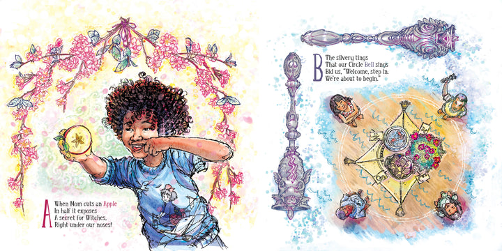 A child excitedly holds up a halved apple revealing a star, evoking nature magic—echoing the theme of Boys Are Witches Too! by Schiffer Publishing, Ltd.—as people gather around a meal beneath an ornate ceiling and starry cloth.