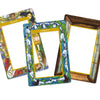 Three illustrated, empty frames overlap. "IDENTITY" shows diverse faces, "HUMANITY" displays joined hands and faces, and an unlabeled frame with a wood-like pattern evokes the spiritual feel of Frame This Oracle by Schiffer Publishing, Ltd.