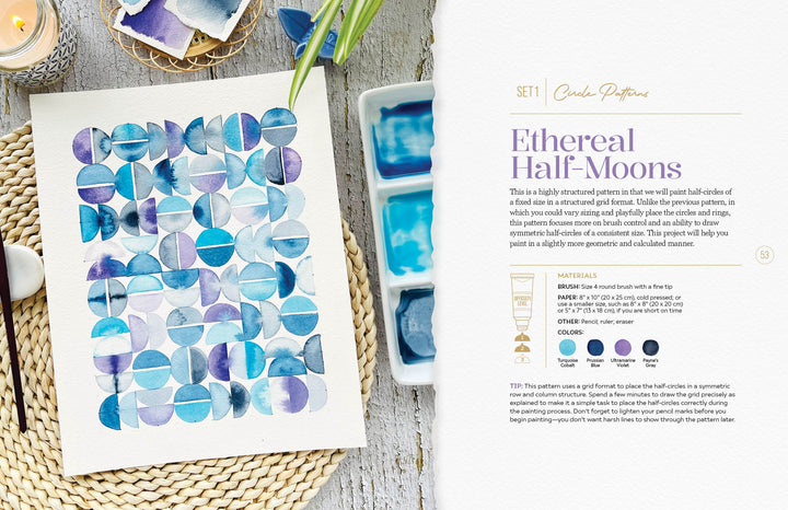 A beginner watercolor project from Schiffer Publishing, Ltd.'s Modern Watercolor Workshop shows overlapping blue and purple half-moons on a woven mat, with supplies and step-by-step instructions included.