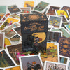 The Legend of Sleepy Hollow Tarot—Headless Horseman Edition by Schiffer Publishing, Ltd. stands upright, with vibrant tarot cards spread in the background to create a mysterious and magical atmosphere.