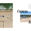 Aerial views from "Out East from Above" by Schiffer Publishing, Ltd.: Left—colorful umbrellas on Coopers Beach’s sand and waves; right—beachfront parking lot and buildings under blue sky. Text labels Coopers Beach, South Fork Long Island.