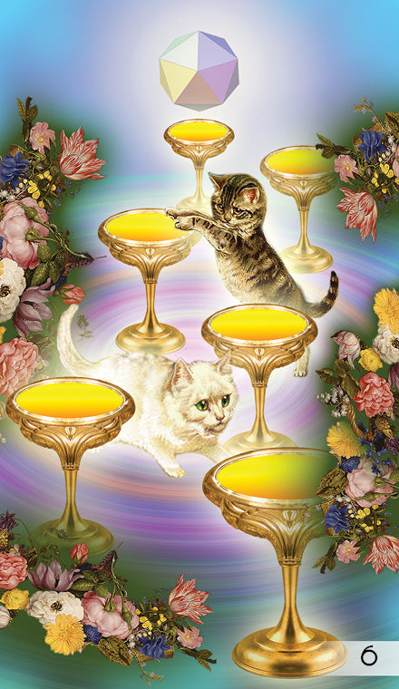 Two kittens frolic among seven golden cups of yellow liquid and flowers. A pastel geometric sphere floats above, with the number six in the corner—an enchanting image from The Unifying Consciousness Tarot by Schiffer Publishing, Ltd.