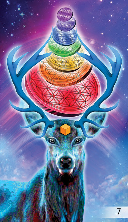 A majestic blue deer with large antlers stands beneath radiant patterned spheres and a golden cube marked with the number 7, capturing the mystical aura of The Unifying Consciousness Tarot by Schiffer Publishing, Ltd. against a cosmic backdrop.