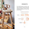 A wooden stool sits on a busy workbench with carpentry tools, shavings, and plants by a sunlit window. The adjacent page of "Welcome to Woodworking" by Schiffer Publishing, Ltd. features beginner project diagrams and easy text.