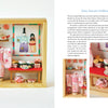 The book "Kawaii Appliqué Quilts from Japan" by Schiffer Publishing, Ltd. features quilt-inspired miniature Hina Matsuri dollhouses with handmade dolls, furniture, and accessories in pink floral patterns, plus a set description on the right page.
