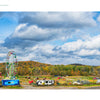 Capture scenic Mid-Atlantic travel with "Back Roads of the Mid-Atlantic States" by Schiffer Publishing, Ltd.—featuring colorful New Jersey fairgrounds, Ferris wheels, food stands, and rolling autumn hills under a blue sky.