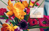 Close-up of a vibrant floral arrangement with orange, pink, yellow, and purple blooms. A white text box reads: "Chapter 3: The Basic Principles of Eco-Friendly Flower Arranging in Starting Your Floral Design Studio by Schiffer Publishing, Ltd.