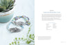 Two handmade beaded bracelets with ornate silver links sit beside a potted succulent. The left page shows the bracelets; the right features "Projects and Techniques for Metal Clay Jewelry" by Schiffer Publishing, Ltd., plus tools and techniques.