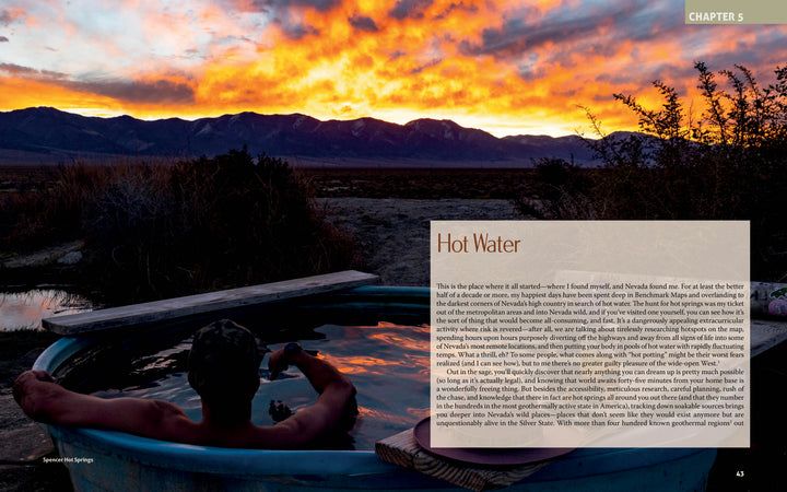 A person relaxes in an outdoor hot spring tub at sunset with mountains behind them. The right side features text about hot springs and "Finding Nevada Wild" from Schiffer Publishing, Ltd., set amid Nevada’s adventures and natural landscape.
