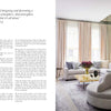 A modern, elegant living room inspired by Penny Drue Baird, featuring elements from "PowerHouse" by Schiffer Publishing, Ltd.: a light palette, curved sofa, gold-accented glass table, large windows, mirrored panels, and a contemporary fireplace.