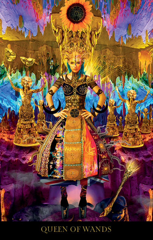 The Starman Tarot Remastered by Schiffer Publishing, Ltd. features a fantasy-inspired Queen of Wands card with a regal woman in ornate, colorful attire amid golden statues, crystals, and surreal, fiery technoshamanic scenery, her wand at her feet.