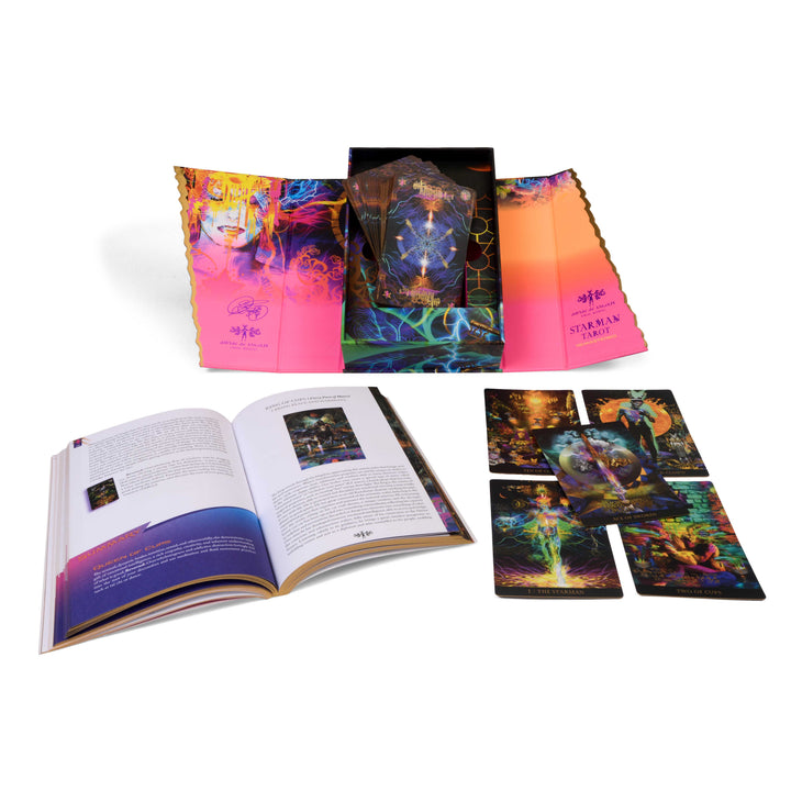 The Starman Tarot Remastered by Schiffer Publishing, Ltd. is shown with a colorful box, an open illustrated guidebook, and several tarot cards on a white surface—all featuring vivid psychedelic artwork by Davide De Angelis.