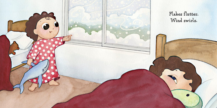 A child in red polka dot pajamas points at swirling snow, clutching a stuffed dolphin, as another sleeps beneath a red blanket. “Hello, Snow!” by Schiffer Publishing, Ltd. is a winter sensory book: “Flakes flutter. Wind swirls.”.